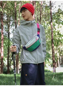 Detail of the vibrant dopamine-style colorful chest bag worn outdoors