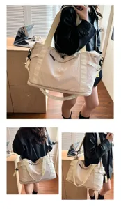 Large capacity travel duffel bag detail, lifestyle showcase with model carrying shoulder bag.