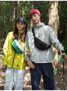 Asian models showcasing colorful dopamine and black crossbody waist bags in a forest