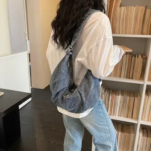 Trendy large capacity denim hobo shoulder bag with knotted strap for casual college student style