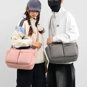 Casual Japanese style messenger bag with multiple pockets for cycling and commuting