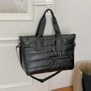 Black quilted large capacity shoulder bag with puffy padded design for women