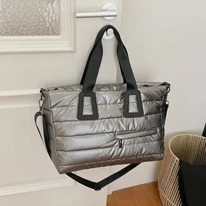 Silver metallic quilted puffer tote bag with large capacity and crossbody strap