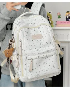 Grande zaino scolastico bianco con motivo a stelle e portachiavi a forma di orsetto