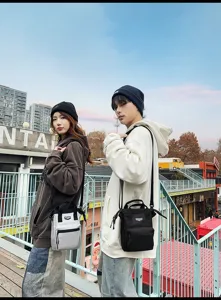 Stijlvolle unisex casual crossbody telefoontassen in zilver en zwart streetstyle