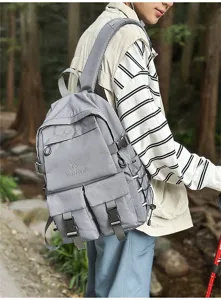 Zaino grigio alla moda di grande capacità con tasche multiple per studenti