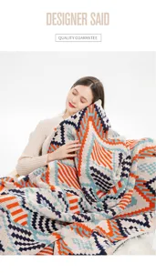 Close-up of bohemian style knitted blanket with vibrant ethnic geometric pattern