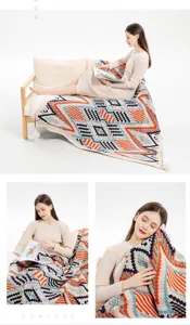Detail of a Bohemian knitted throw blanket with colorful geometric patterns and tassels.