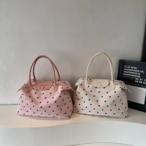 Borsa da viaggio capiente e leggera con simpatico motivo a fragole per donne moderne