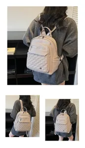 Back view of a woman wearing a minimalist beige soft leather quilted backpack for travel