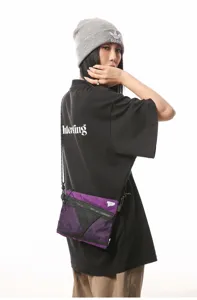Purple Japanese street style utility crossbody bag with mesh pocket shown on model