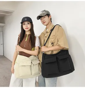 Asian models wearing oversized retro canvas messenger bags with double front pockets for students