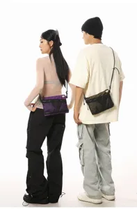Lifestyle view of purple and olive green Japanese tactical crossbody sacoche bags
