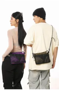 Unisex Japanese techwear crossbody bags in purple and olive green shown on models for hiking
