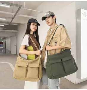Models showcasing large vintage canvas messenger bags in olive green and khaki colors