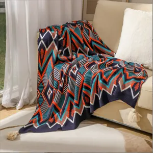 Bohemian style ethnic knit throw blanket with tassels and geometric patterns for sofa decor