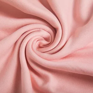 Elegant soft pink wool-viscose blend scarf shawl showing detailed fabric texture macro
