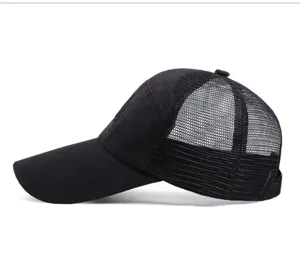 Detailed side view of a black baseball cap with an extended brim and mesh back