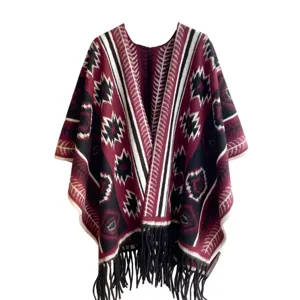 Front view of a wine red Bohemian shawl with geometric patterns and black tassels.