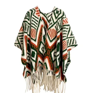 Detailed view of Bohemian ethnic style shawl with fringe and geometric pattern