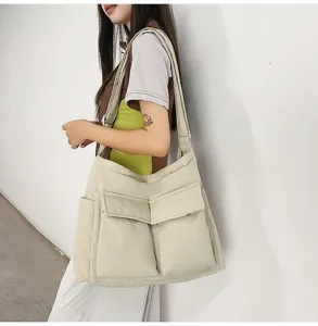 Vintage beige canvas crossbody bag with large capacity, ideal for college students.