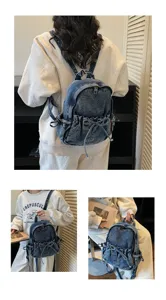Petit sac à dos en jean bleu élégant avec nœud pour l'usage quotidien décontracté des femmes.