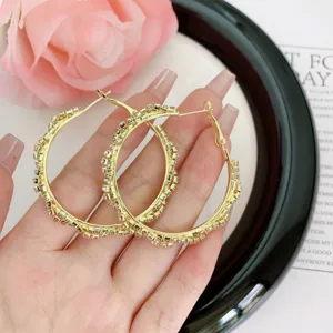 Luxury large gold-plated round hoop earrings encrusted with sparkling rhinestone crystals