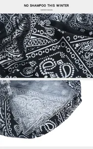 Close-up macro view of black and white paisley print bandana hat and interior stitching detail