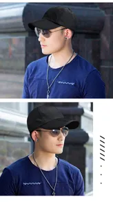 Side view of a black quick-dry baseball cap with a foldable brim worn by a model