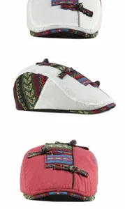 Detailed view of ethnic style flat caps featuring woven patterns and fabric knots