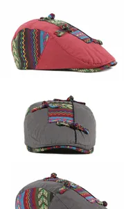 Detailed views of ethnic style flat caps with woven patterns and rope knots.