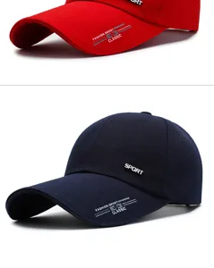 Detailed view of long-brimmed sports baseball caps in red and navy blue