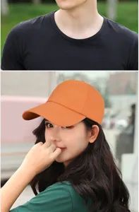 Detail view of a woman wearing a vibrant orange quick-dry baseball cap for sun protection