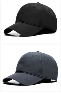 Detailed view of quick-drying breathable baseball caps shown in black and dark grey colors.