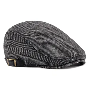 Grey herringbone flat cap with adjustable leather side strap