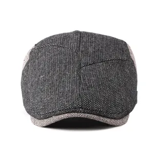 Vintage grey herringbone wool flat cap with contrasting brim for autumn and winter warmth