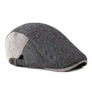 Vintage herringbone wool flat cap with stylish patchwork design and adjustable strap