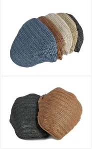 Close-up detail of breathable mesh flat caps showing various colors and woven texture
