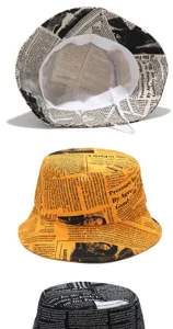 Detailed view of trendy newspaper print bucket hats in orange, white, and black colors