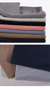 Detailed view of soft, thick winter fleece beanies in various colors for warmth.