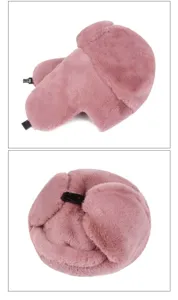 Close-up of a pink winter faux fur trapper hat showing texture and buckle.