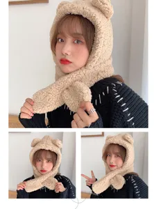 Detail showing soft plush texture and cute bear ears on the warm hooded scarf