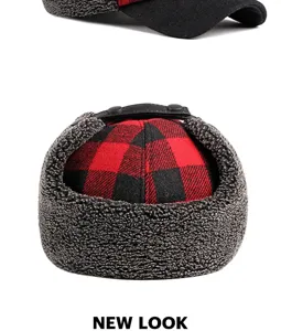 Detailed view of the red and black buffalo plaid winter hat with fleece ear flaps
