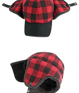 Detail view showing winter red and black buffalo plaid trapper hat with warm fleece lining