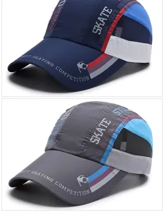 Detailed view of two quick-dry baseball caps in navy blue and gray with skate prints.