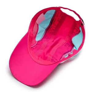 Interior view of a breathable pink and blue quick-dry baseball cap with a long brim