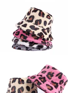 Detailed macro view showing the soft texture and leopard patterns of winter bucket hats