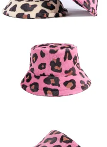 Detailed view of the soft faux rabbit fur texture on a pink leopard print bucket hat