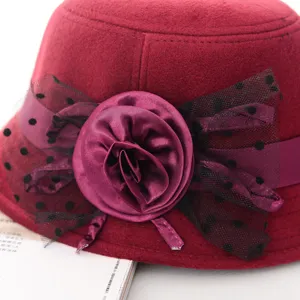 Elegant burgundy wool cloche hat for women with fabric flower and polka dot lace detail