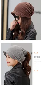 Detail of women's soft brim beanie in brown and grey colors with ponytail hole.